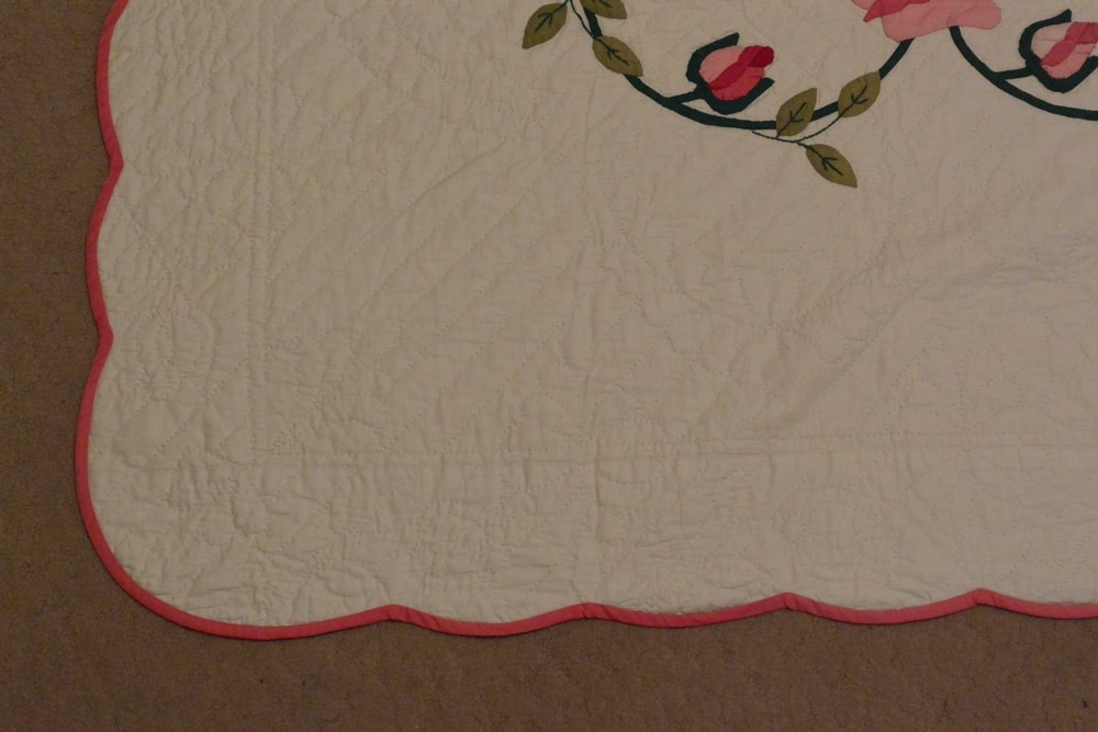 Beautiful Handmade Quilt with Roses and Scalloped Edge