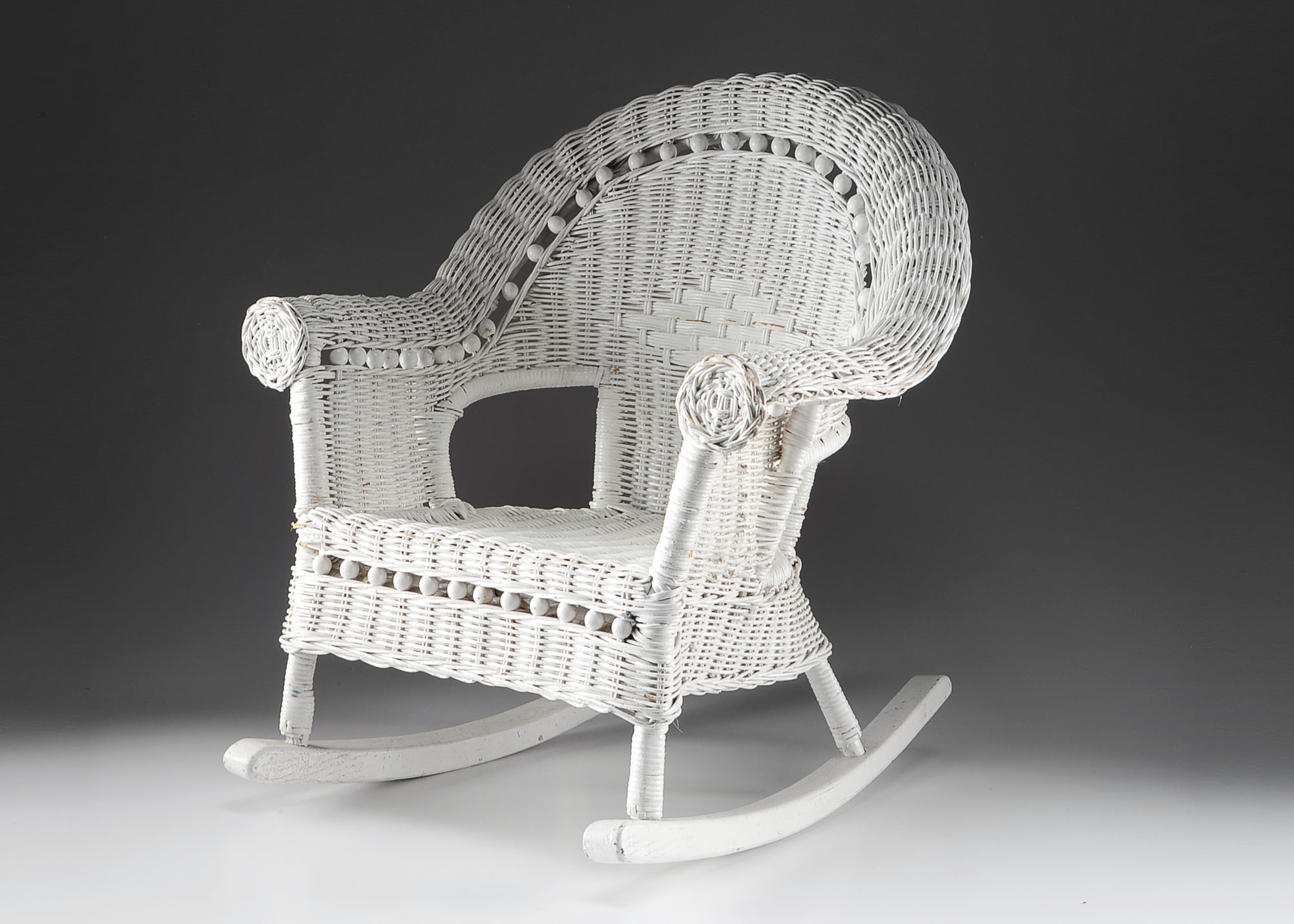 Child's White Wicker Rocking Chair
