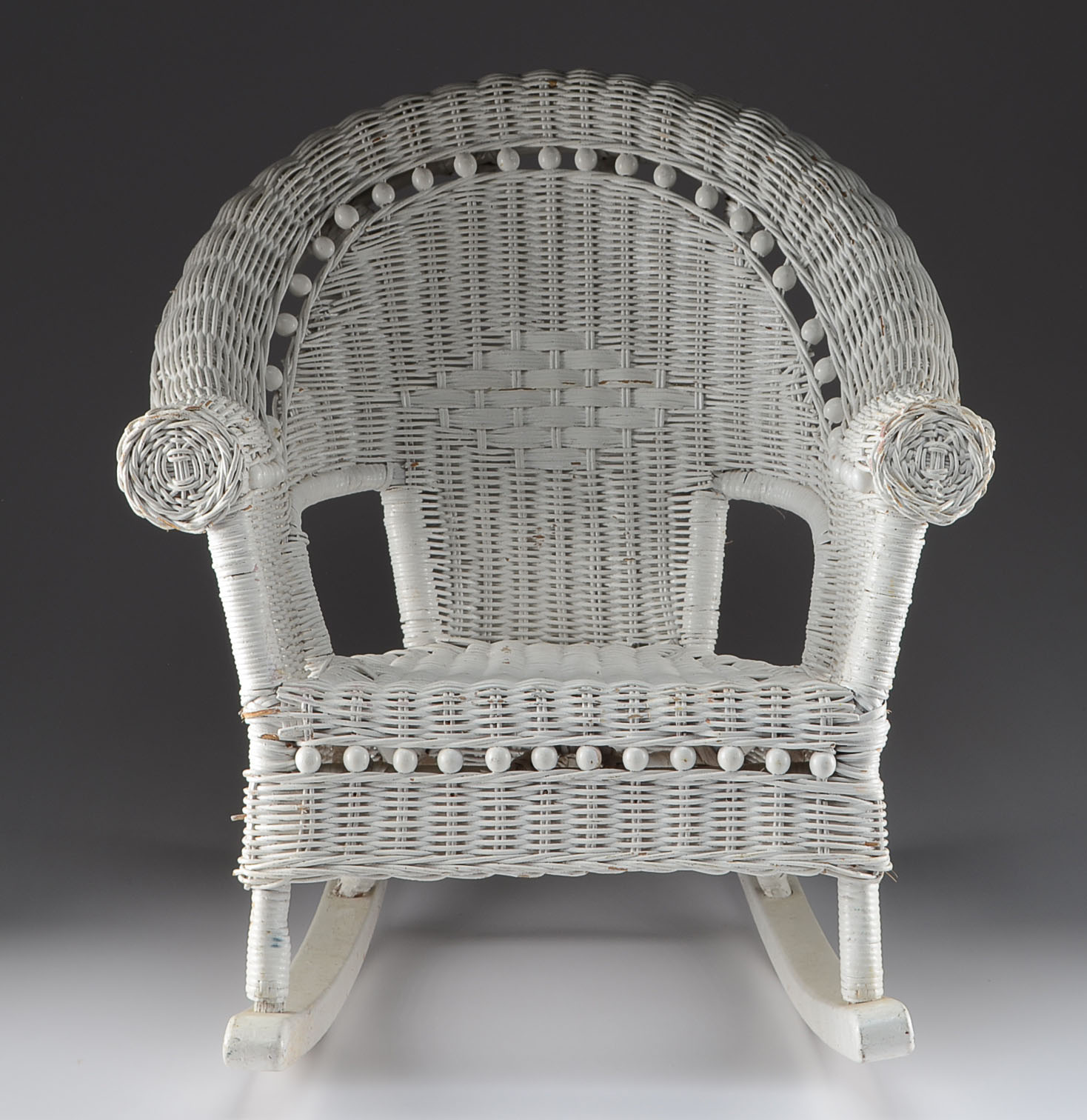 Child's White Wicker Rocking Chair