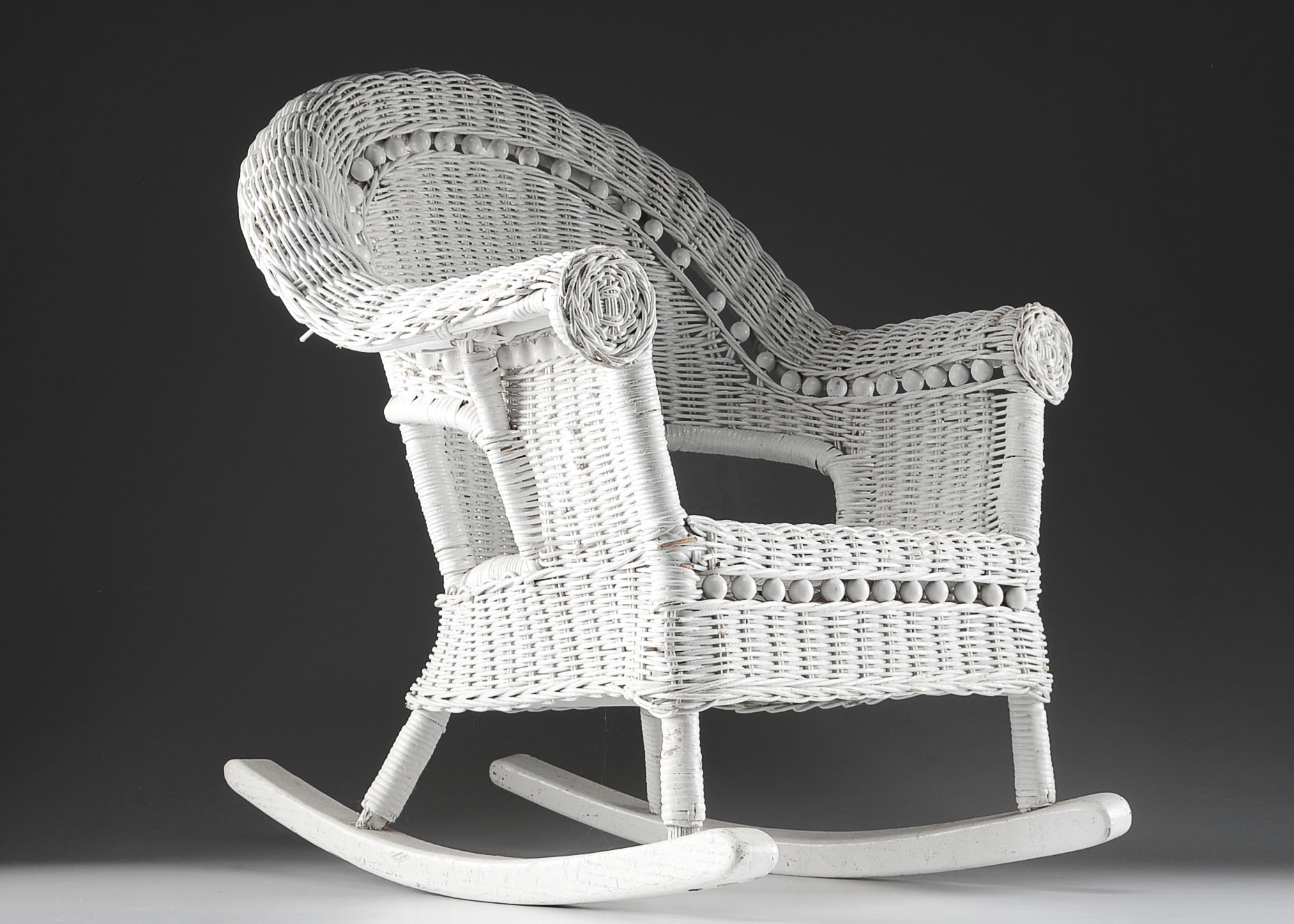 Child's White Wicker Rocking Chair