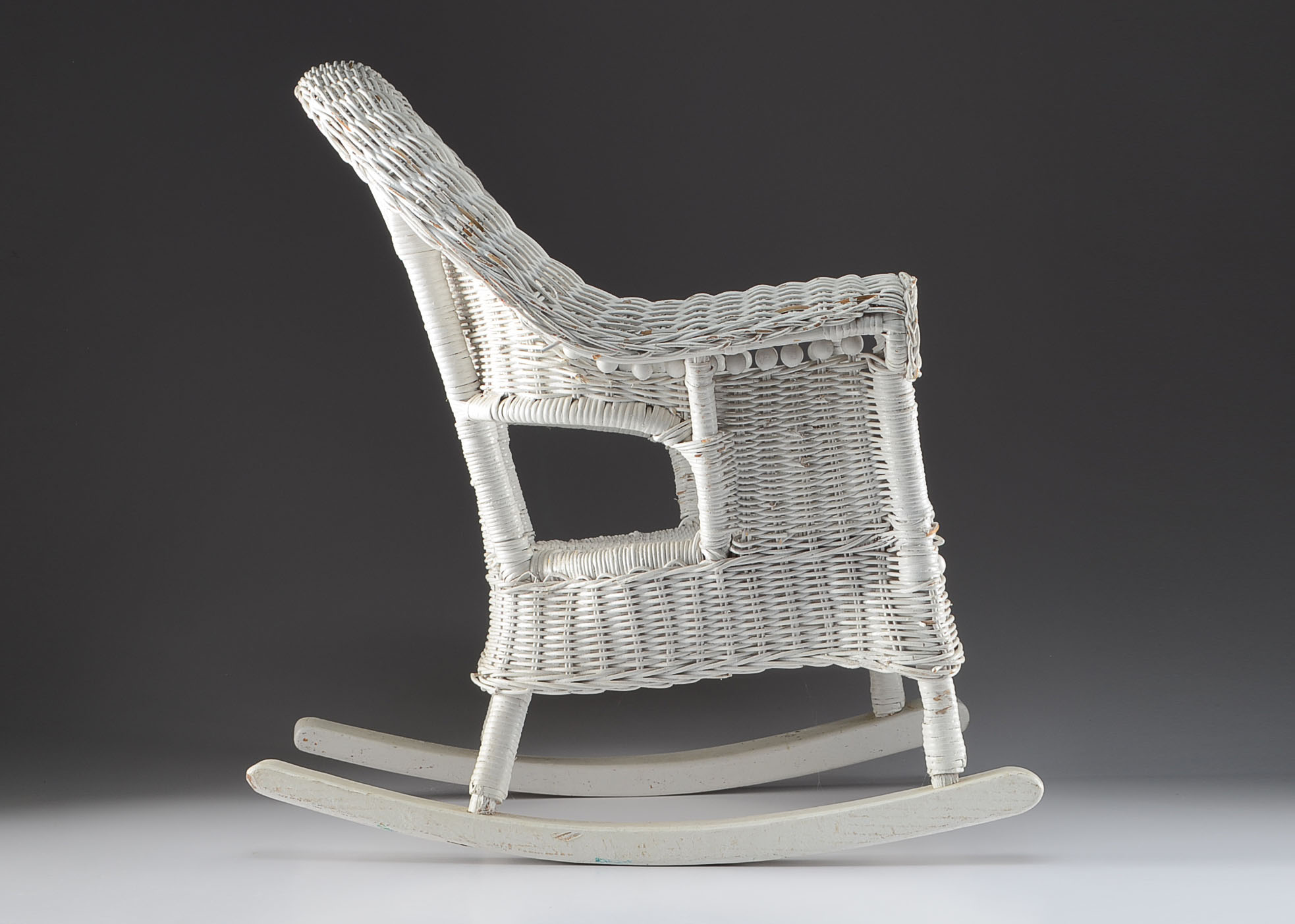 Child's White Wicker Rocking Chair