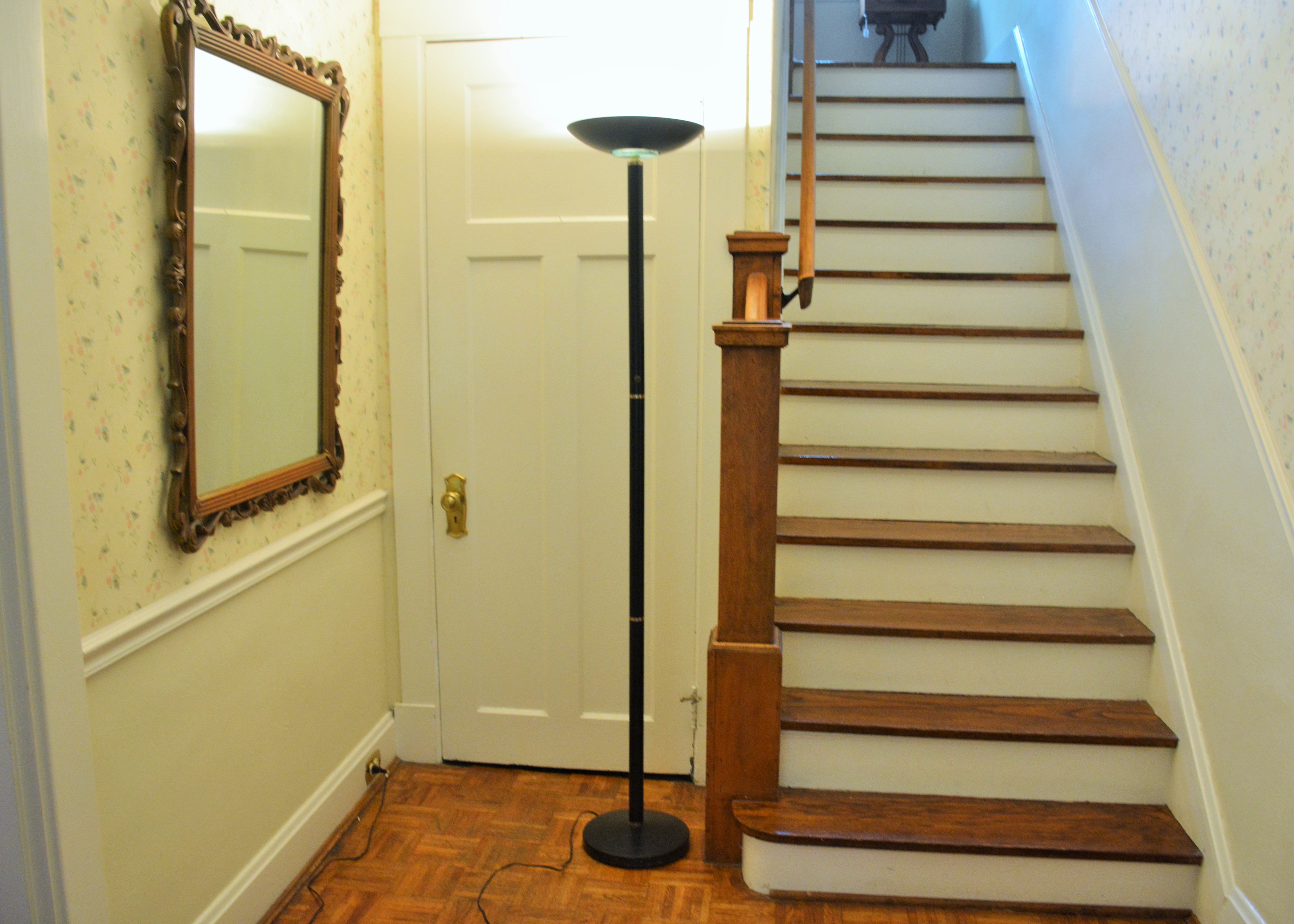 Elegant Tall Floor Lamp in Black with Gold Accents 