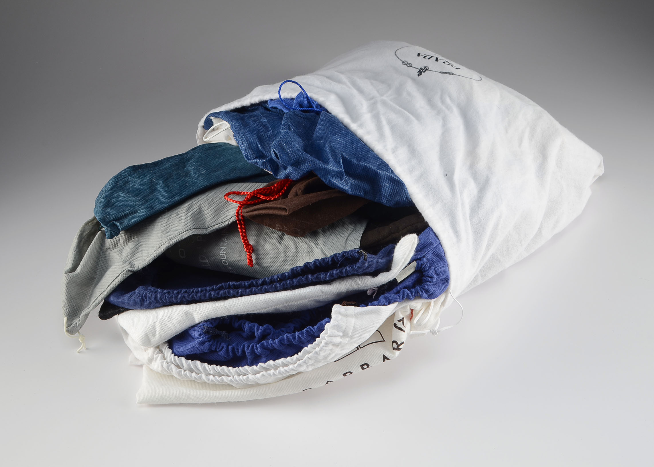 Collection of Over Forty Designer Dust Bags Including Prada