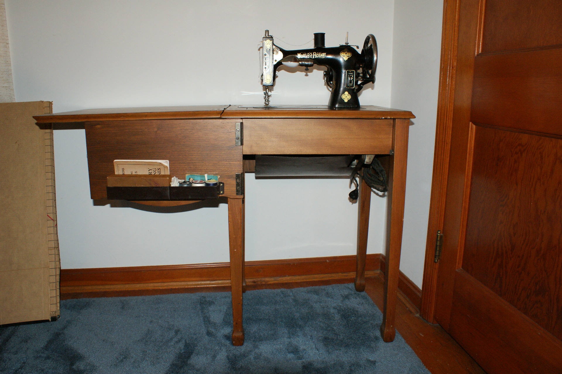 Vintage World's Rotary Sewing Machine with Cabinet and Accessorie