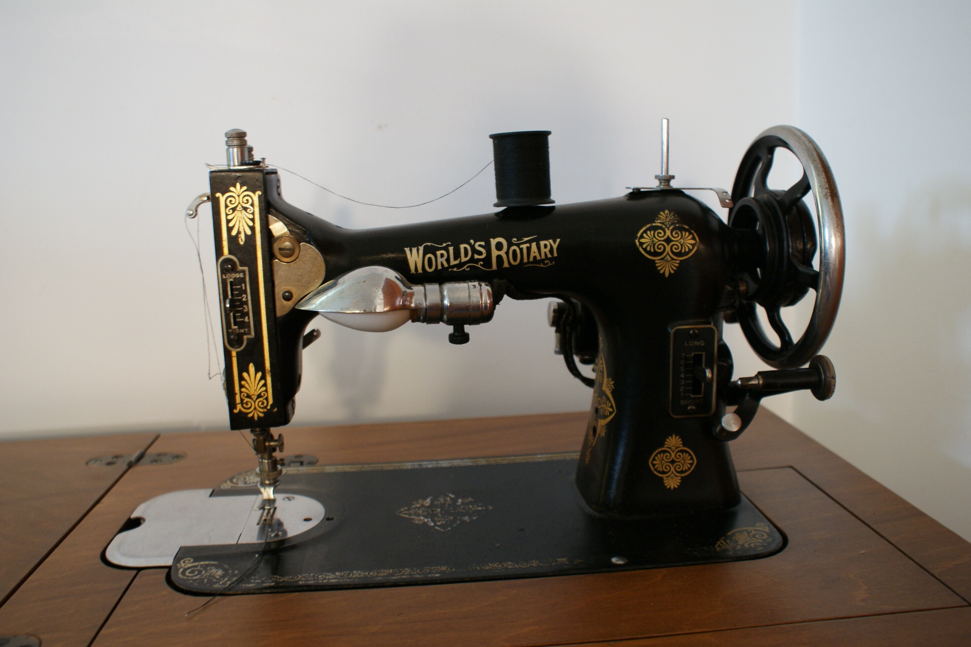 Vintage World's Rotary Sewing Machine with Cabinet and Accessorie