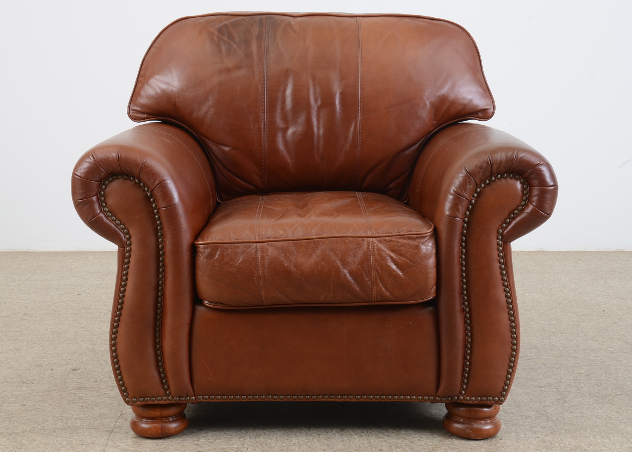 Thomasville Leather Chair and Ottoman