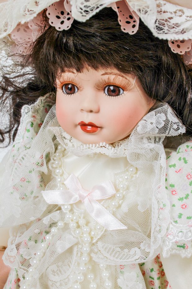 Pair of Porcelain Dolls in Lacy White Dresses