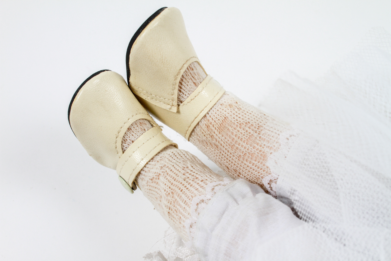 Pair of Porcelain Dolls in Lacy White Dresses