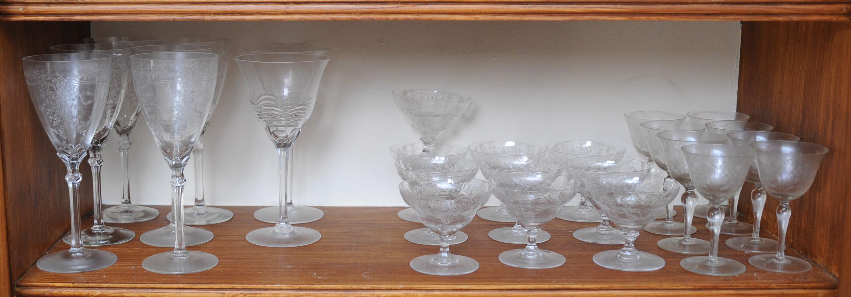 Two Shelves of Assorted Semi-Antique and Modern Glasses