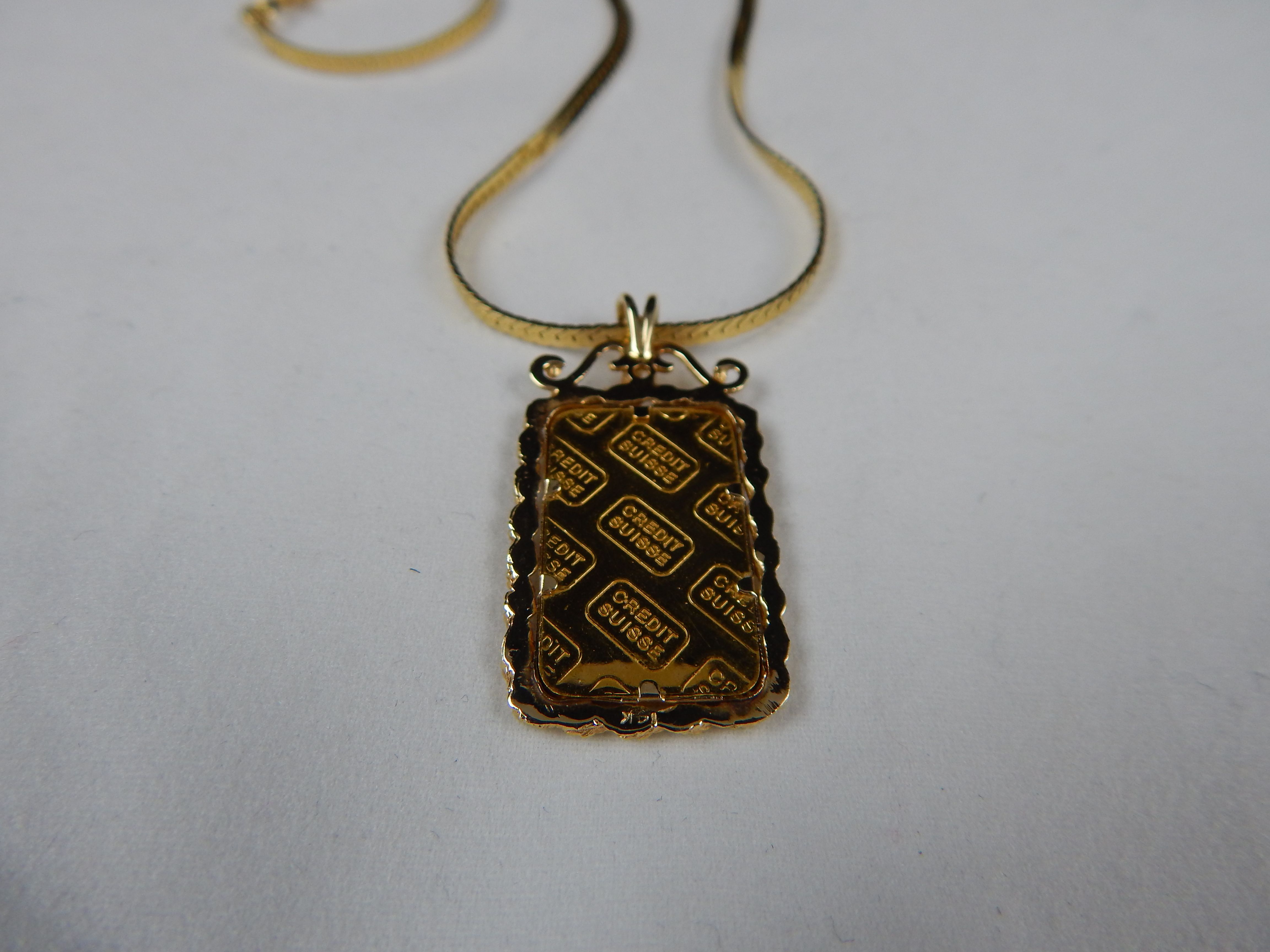 Credit Suisse Gold Pendant Necklace