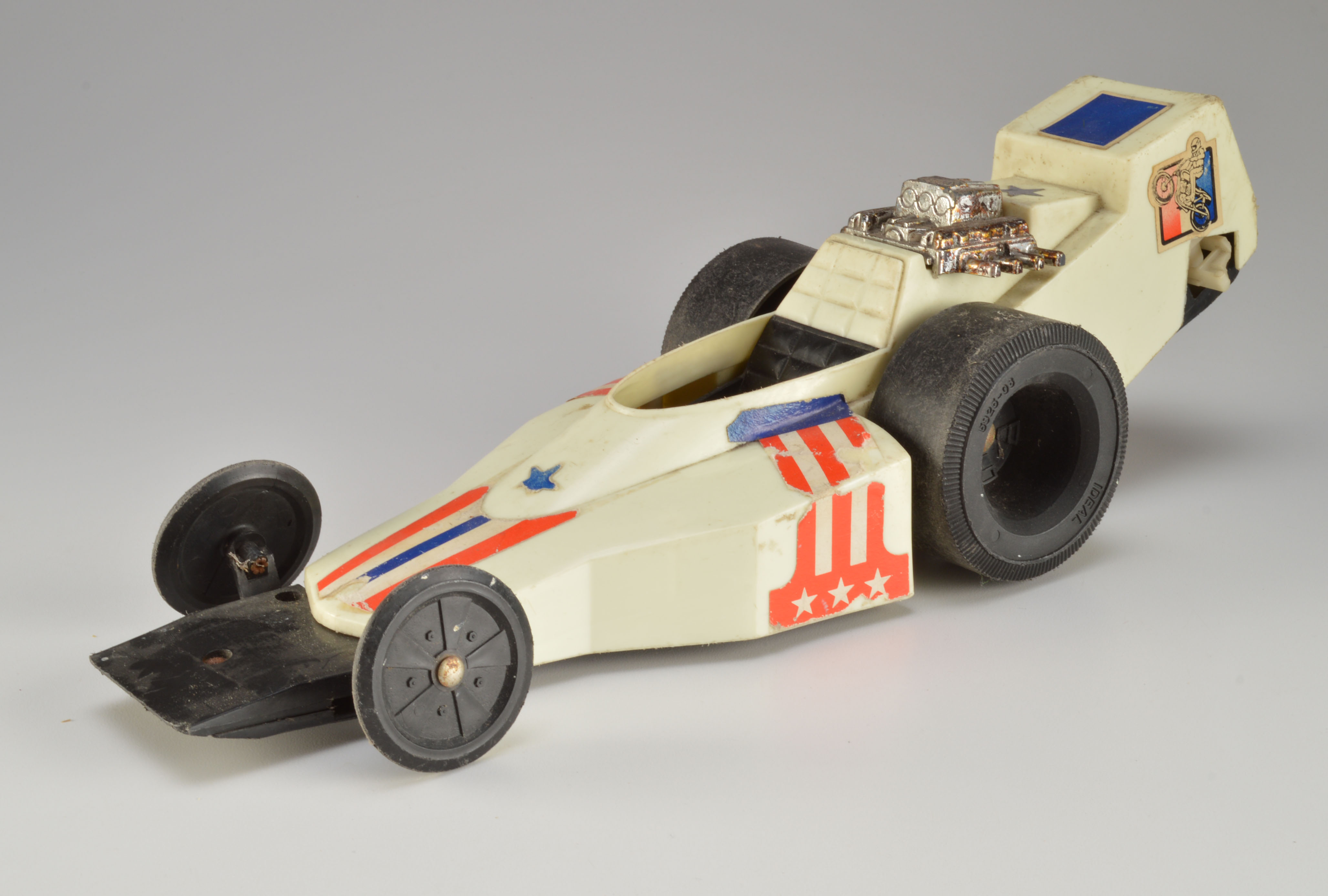 Vintage Eval Knievel and Other Toy Cars