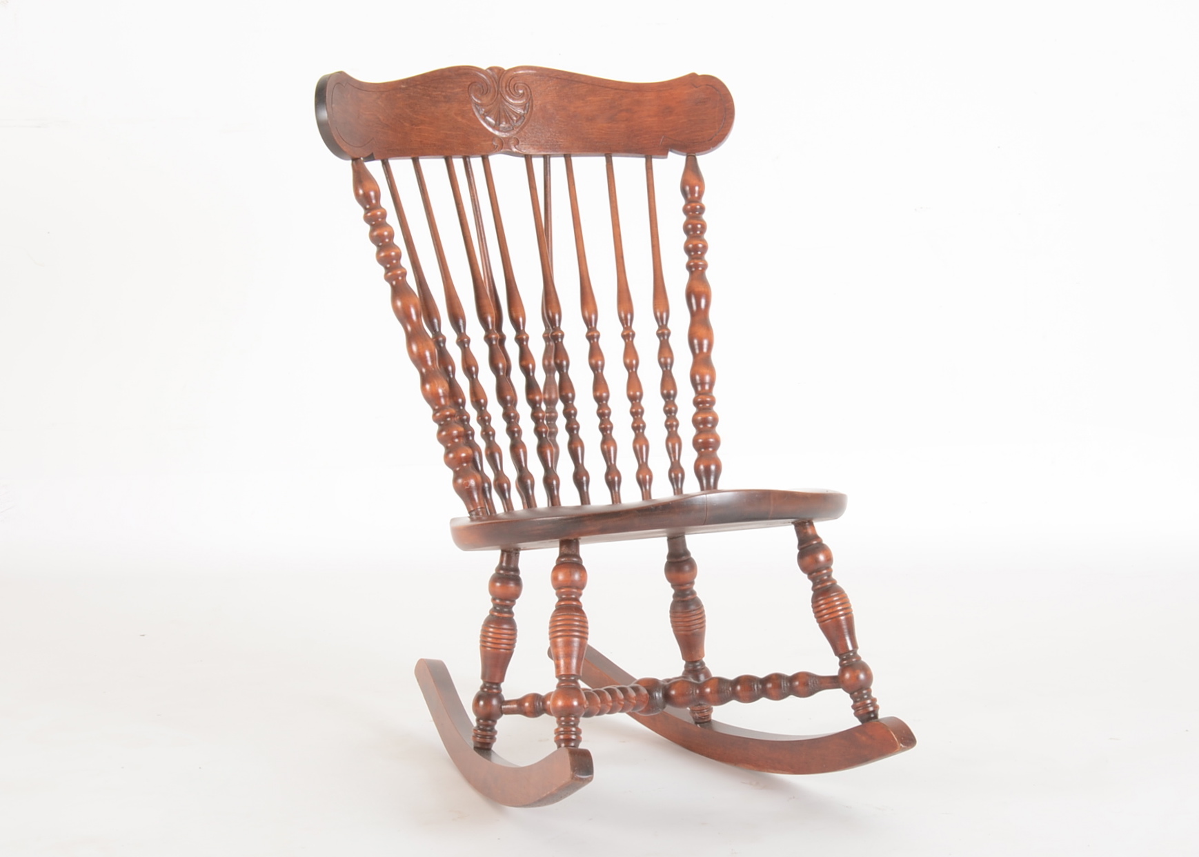 Antique Rocking Chair with Cherry Finish