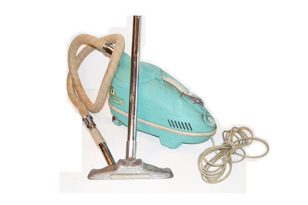 A Vintage 1940's Compact Electra Vacuum with Bags and Attachments
