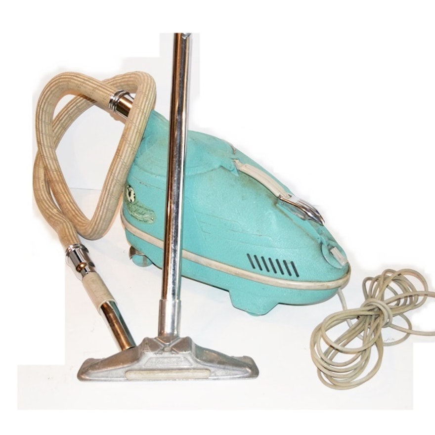 A Vintage 1940's Compact Electra Vacuum with Bags and Attachments