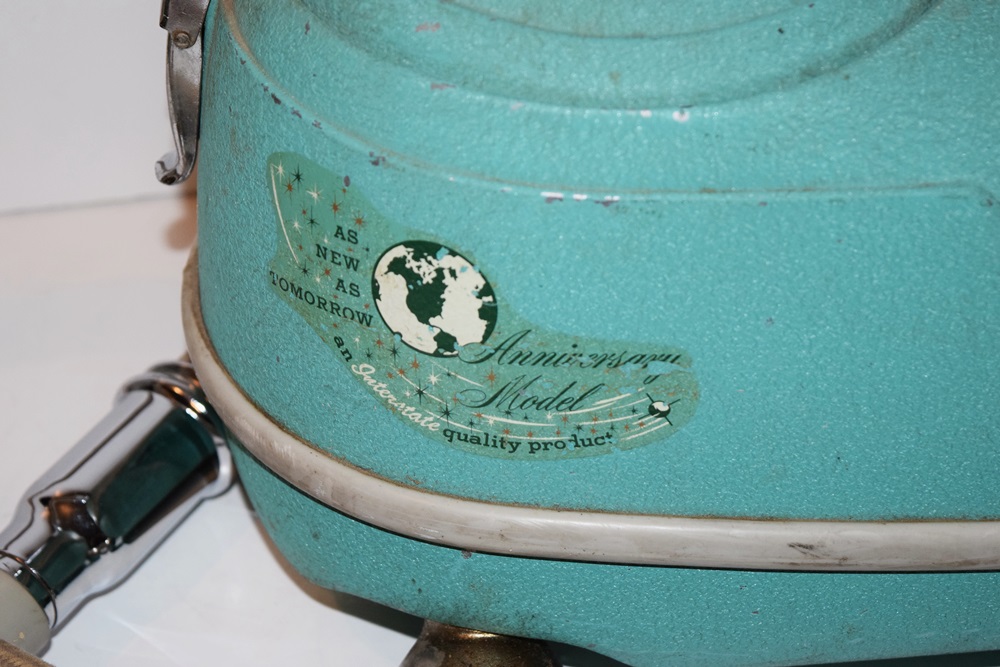 A Vintage 1940's Compact Electra Vacuum with Bags and Attachments