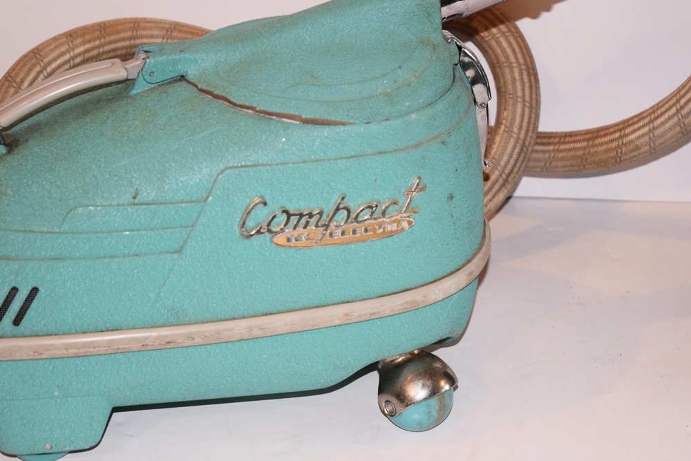 A Vintage 1940's Compact Electra Vacuum with Bags and Attachments