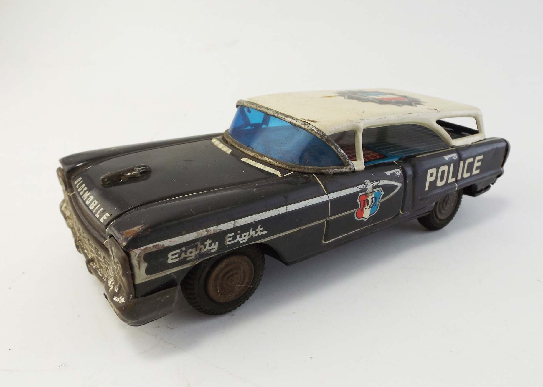 T.N.  Japanese Friction Toy Olds 88 Police Car