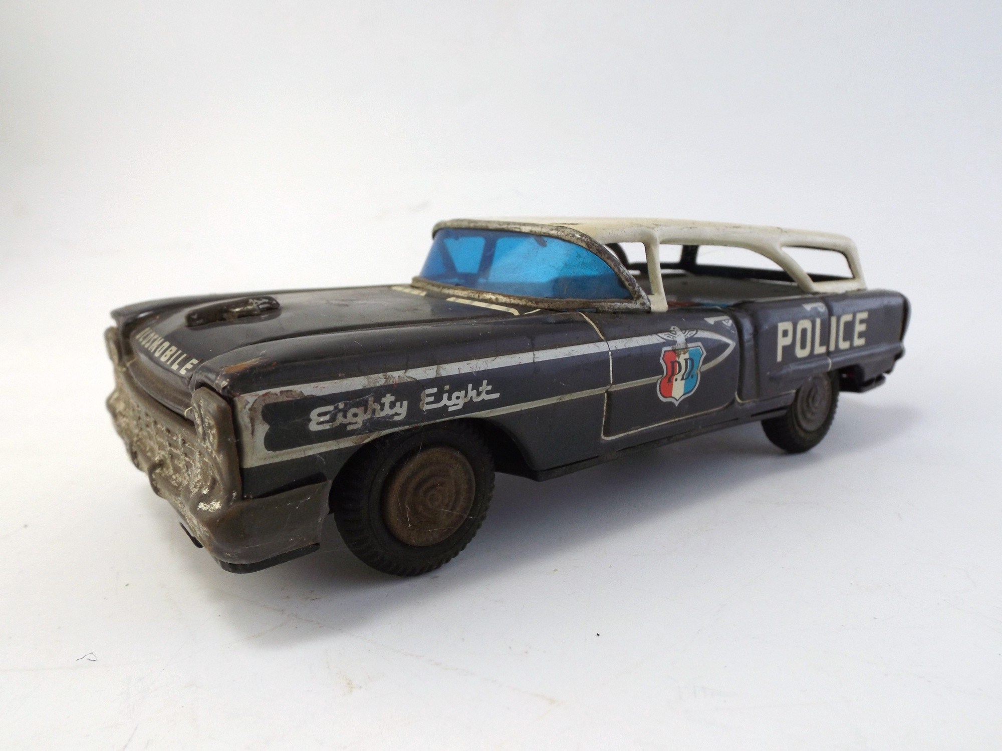 T.N.  Japanese Friction Toy Olds 88 Police Car
