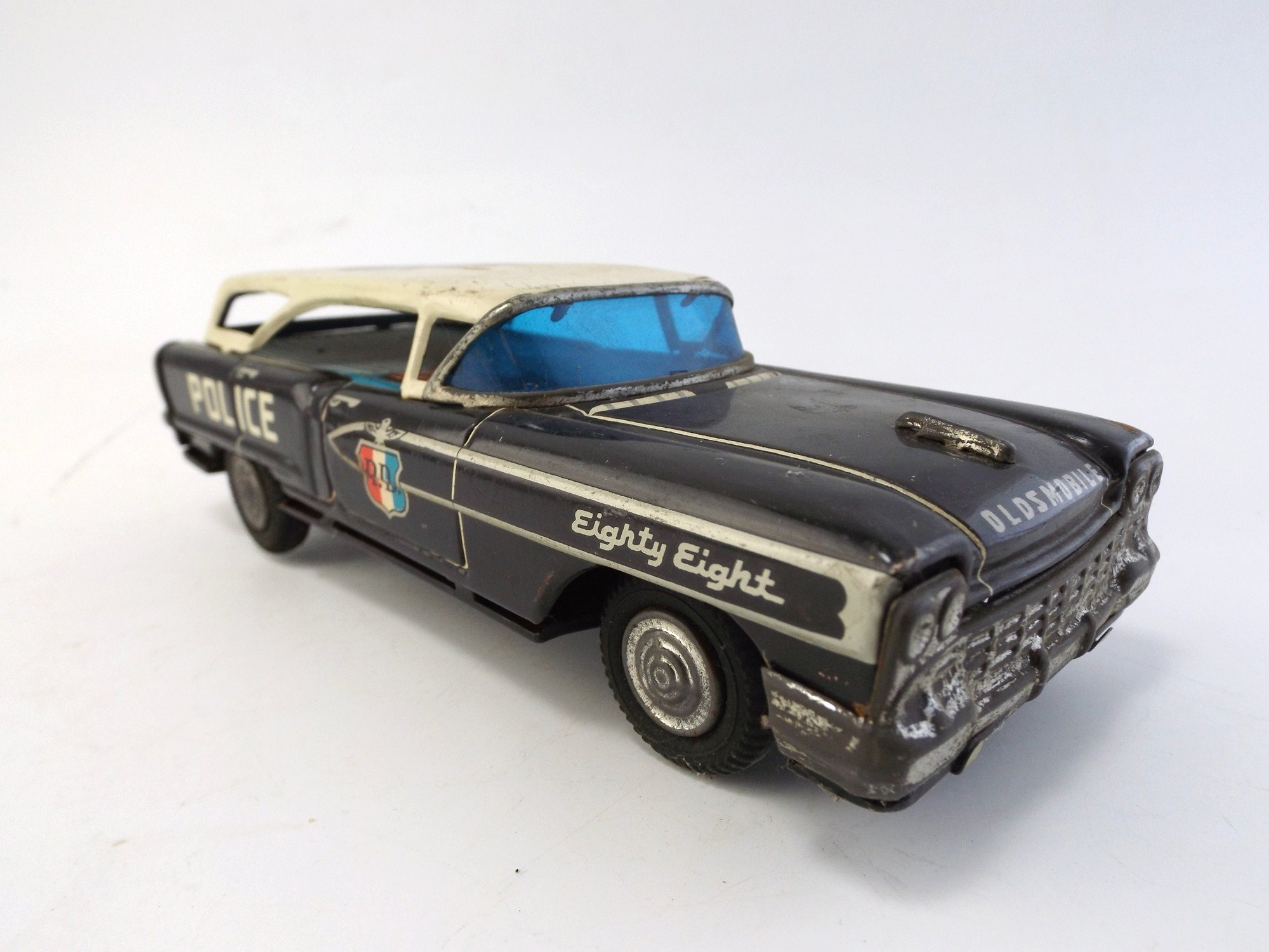 T.N.  Japanese Friction Toy Olds 88 Police Car