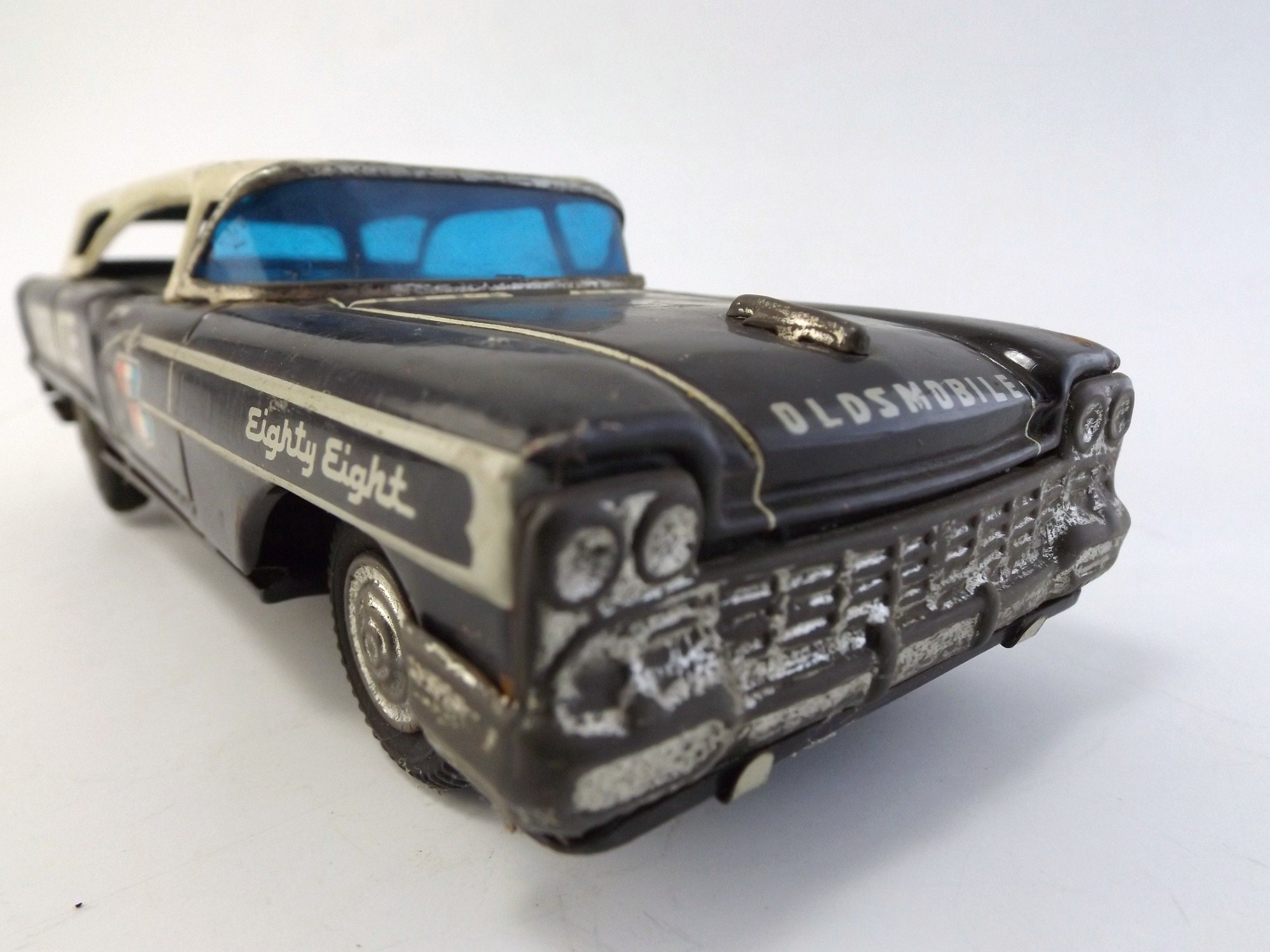 T.N.  Japanese Friction Toy Olds 88 Police Car