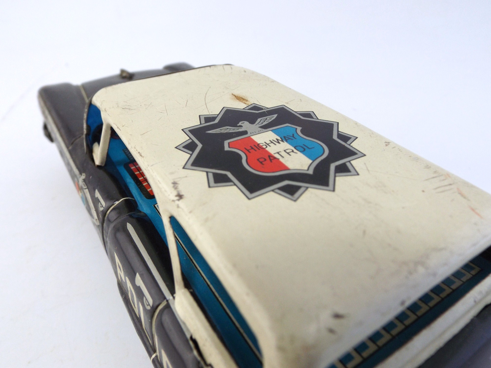 T.N.  Japanese Friction Toy Olds 88 Police Car