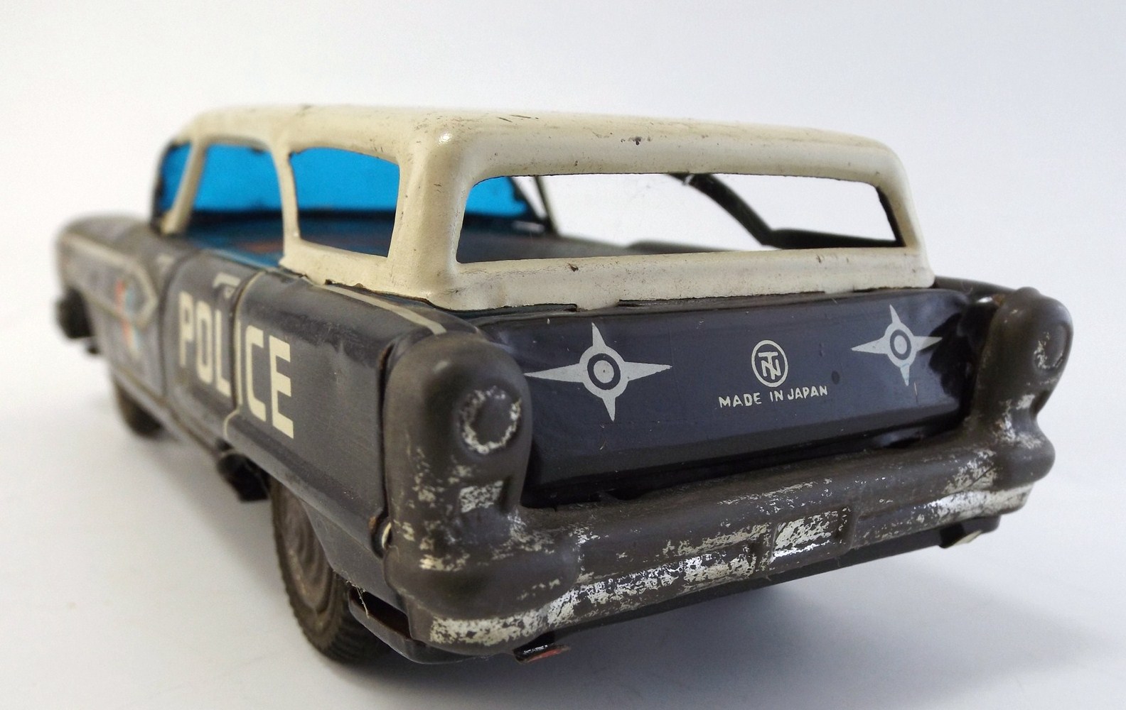 T.N.  Japanese Friction Toy Olds 88 Police Car
