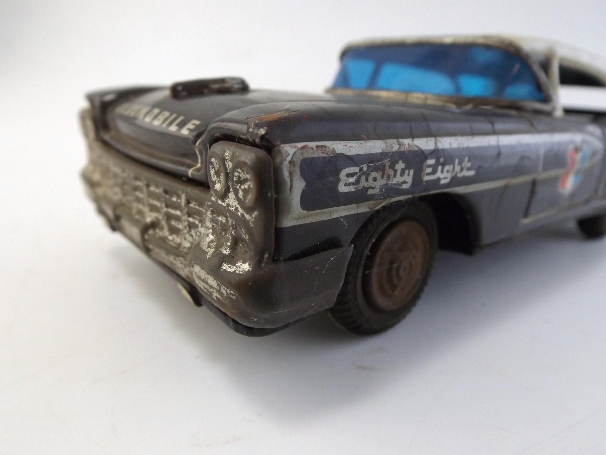 T.N.  Japanese Friction Toy Olds 88 Police Car