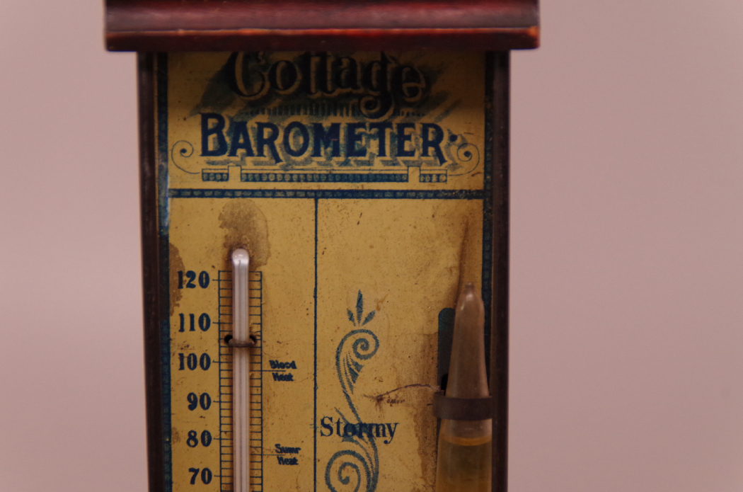 Robinson Crusoe with Vintage Model Canoe and Barometer