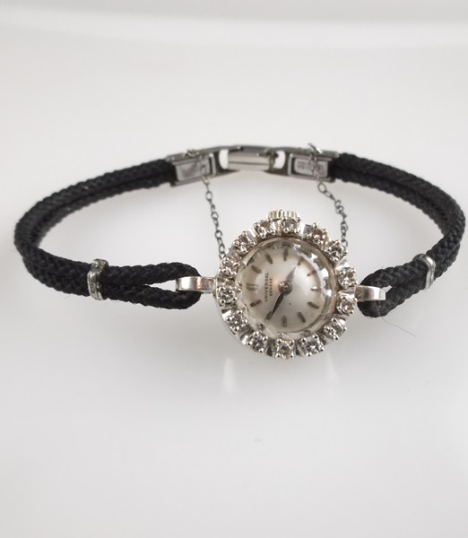 Women's Fourteen Diamond 14K White Gold Universal Geneve Watch