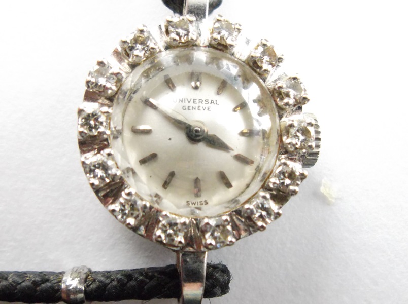 Women's Fourteen Diamond 14K White Gold Universal Geneve Watch