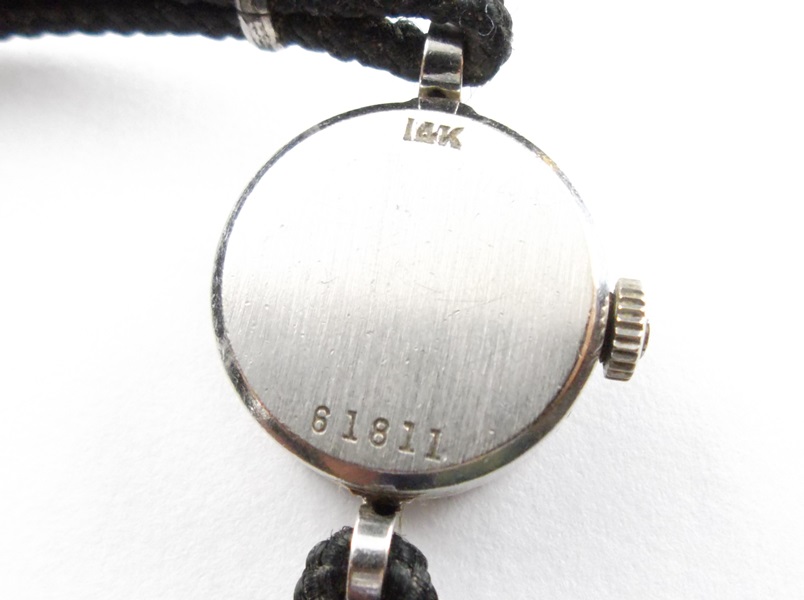 Women's Fourteen Diamond 14K White Gold Universal Geneve Watch