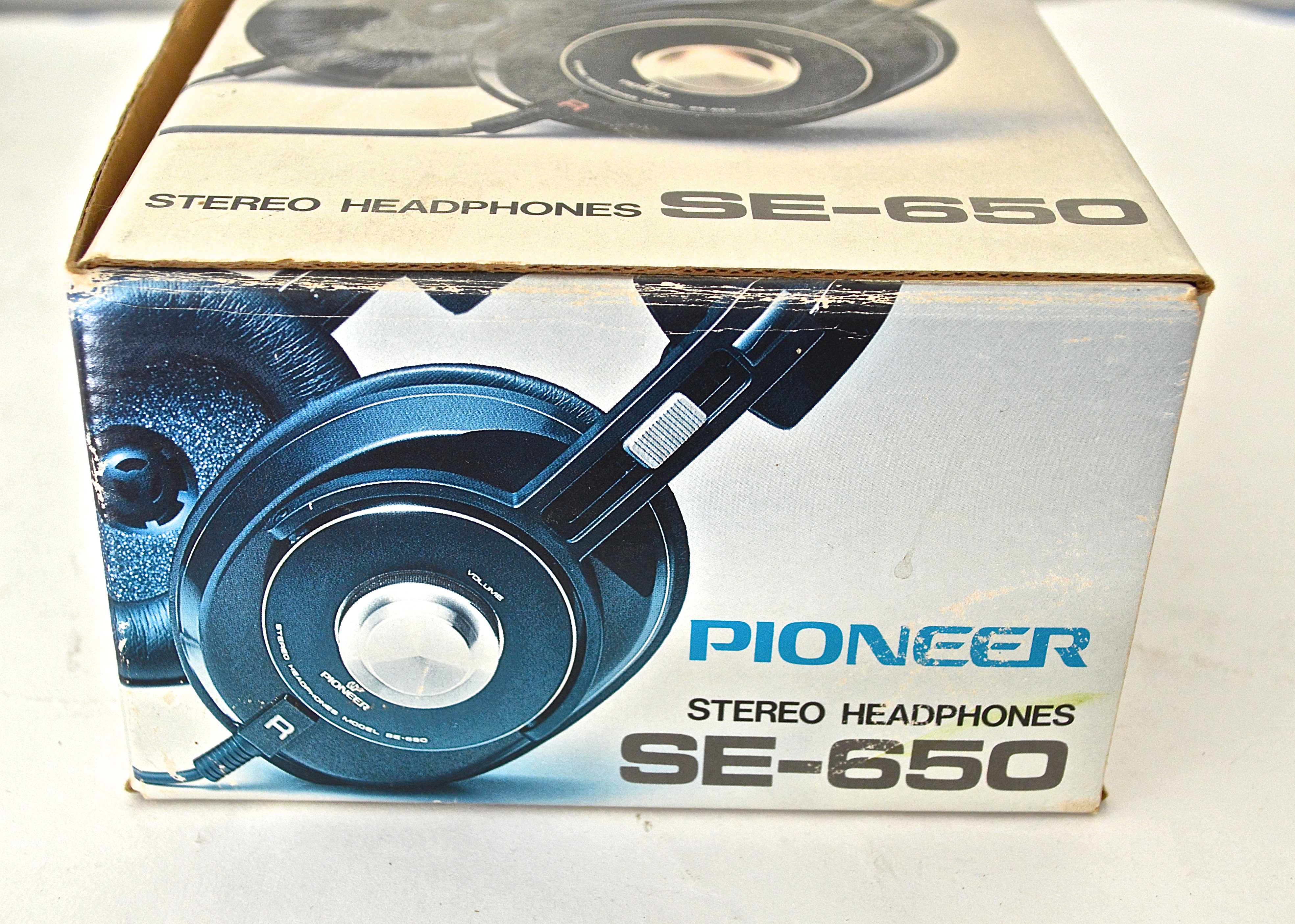 Vintage Pioneer Stereo and Modern RCA Wireless Headphones