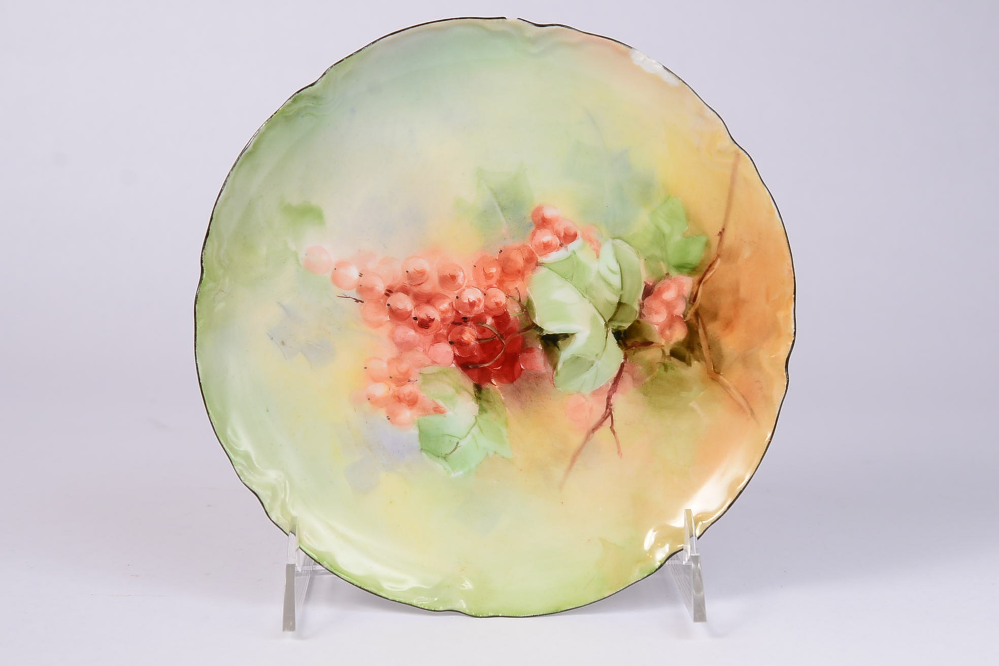 Collection of Four Hand Painted and Signed Haviland Plates