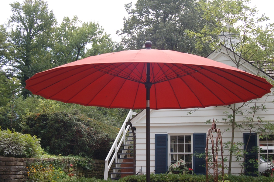 Round Outdoor Patio Table with Four Chairs and Umbrella