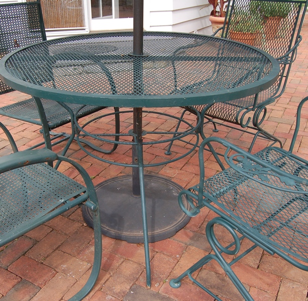 Round Outdoor Patio Table with Four Chairs and Umbrella