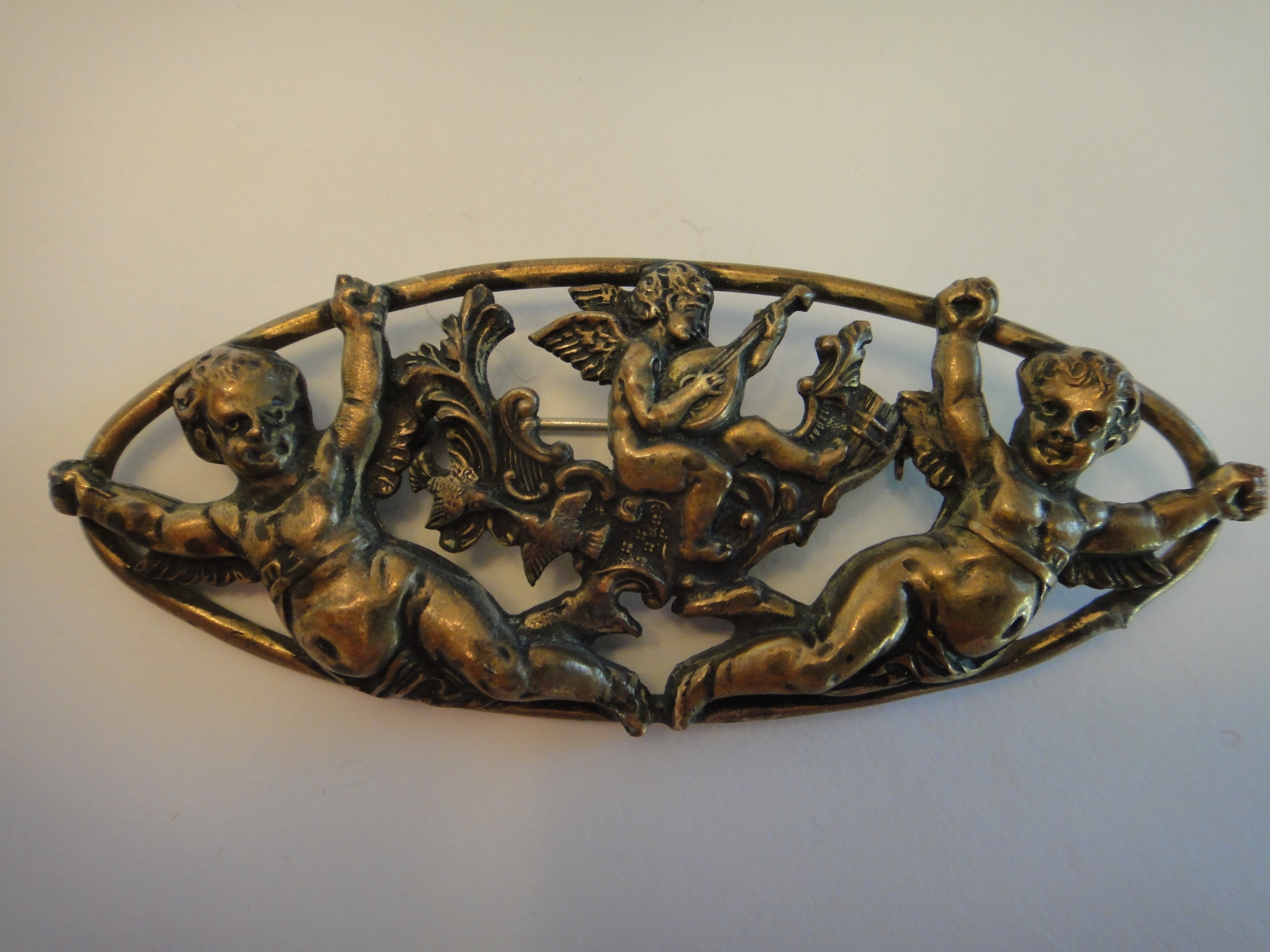 Vintage Oval Brass Cherub Pin