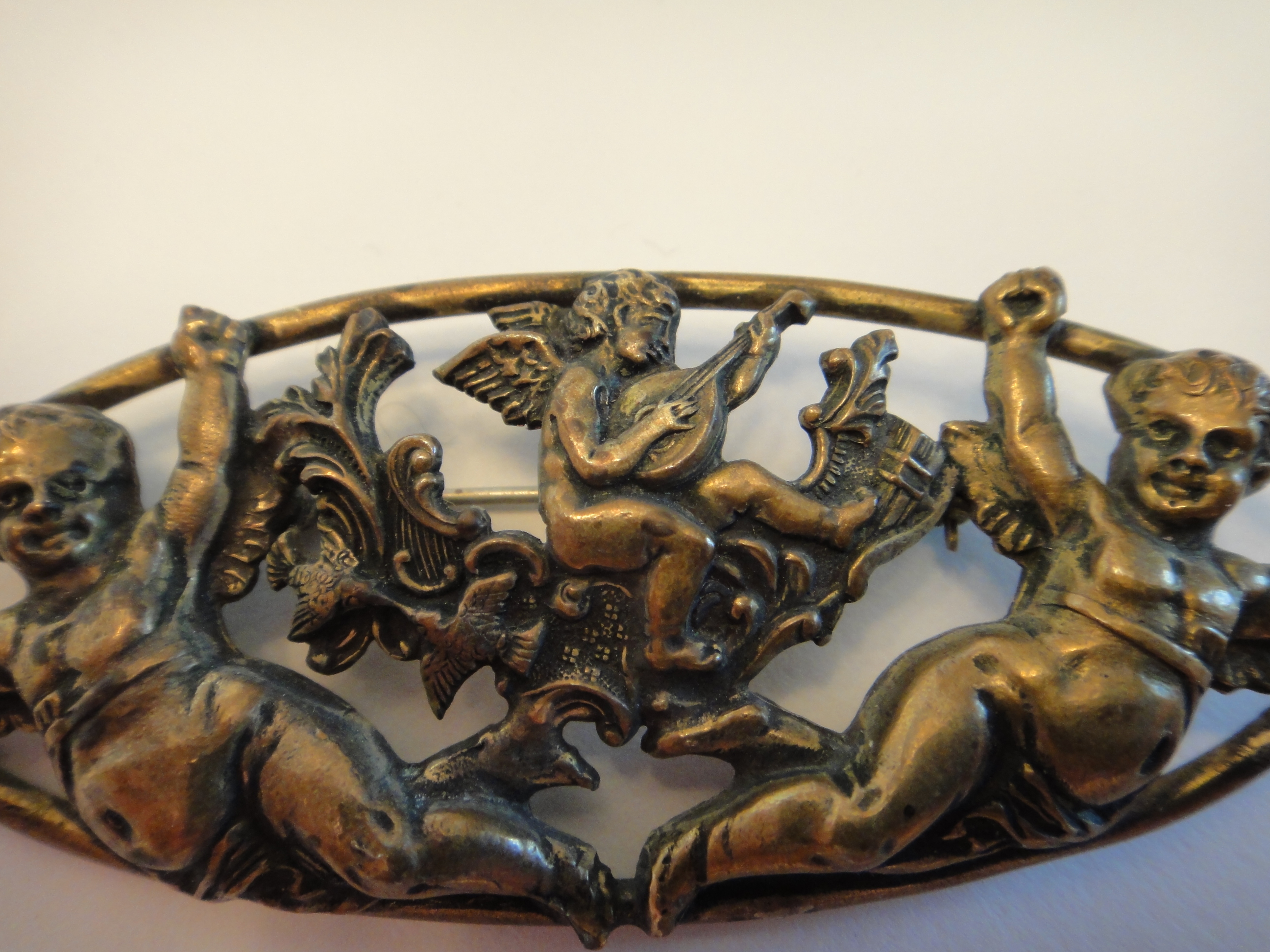 Vintage Oval Brass Cherub Pin