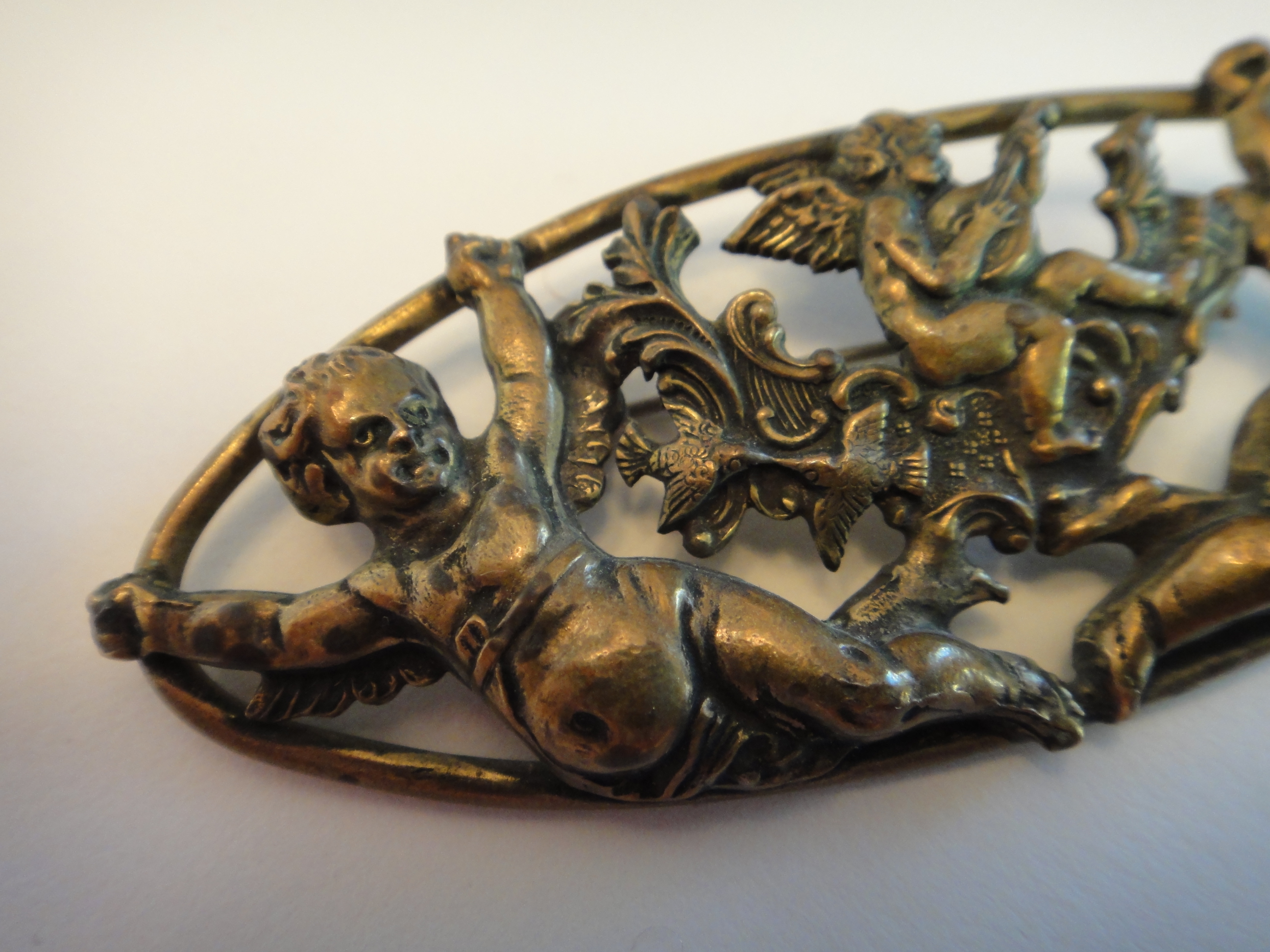 Vintage Oval Brass Cherub Pin