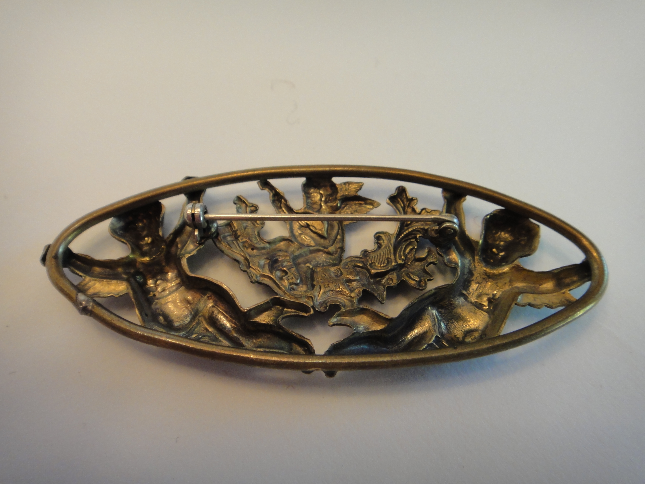 Vintage Oval Brass Cherub Pin