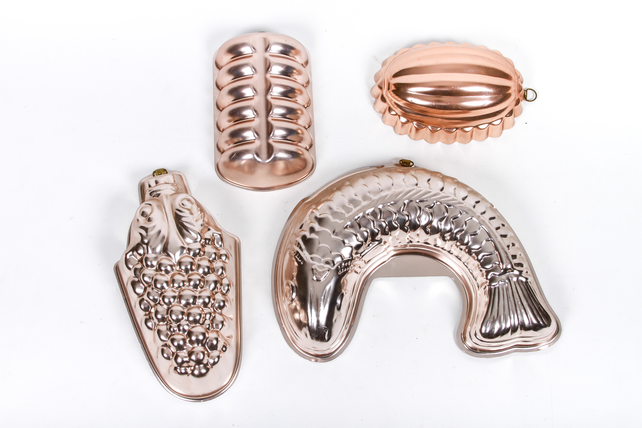 Four Mid-Century Copper Toned Aluminum Molds
