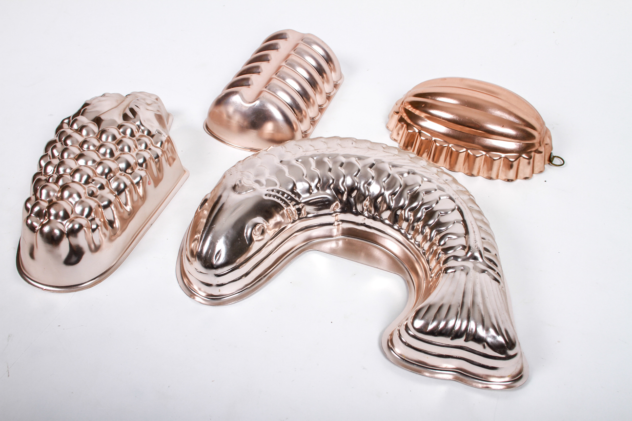 Four Mid-Century Copper Toned Aluminum Molds