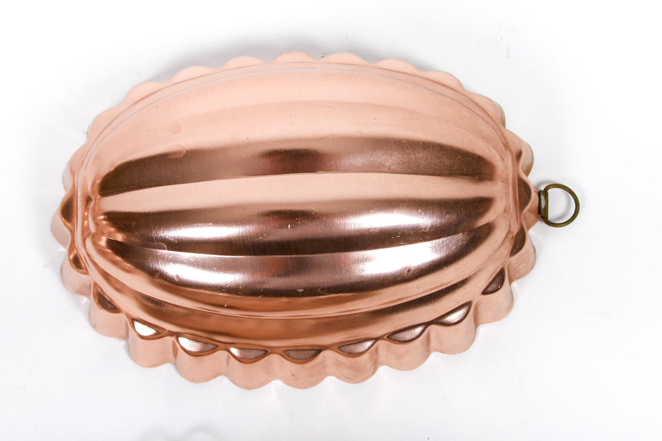 Four Mid-Century Copper Toned Aluminum Molds