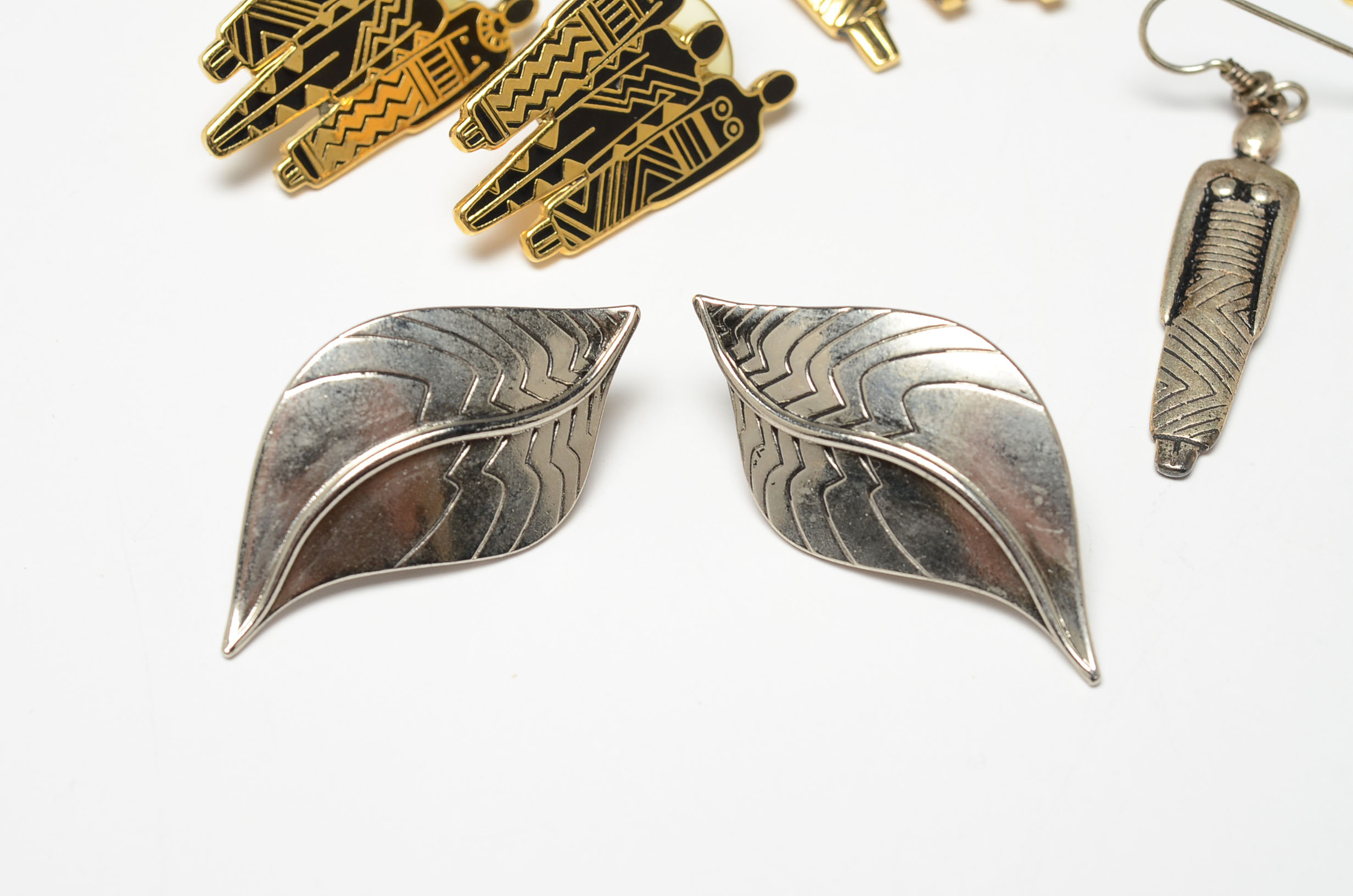 Collection of Laurel Burch Brooches and Earrings