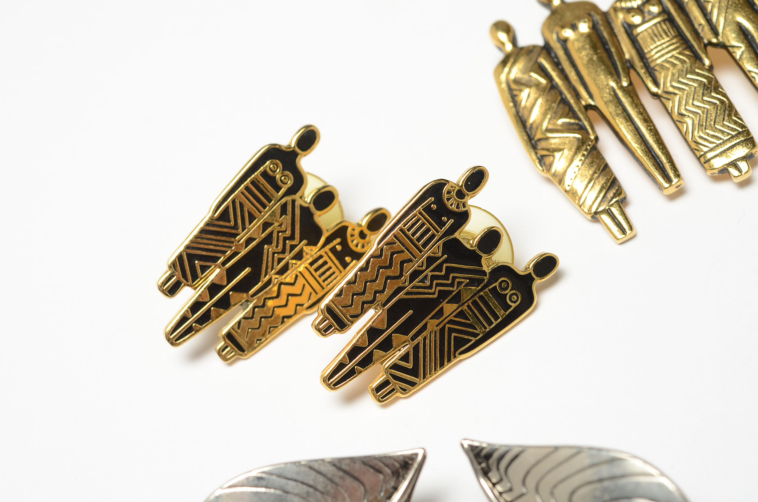 Collection of Laurel Burch Brooches and Earrings