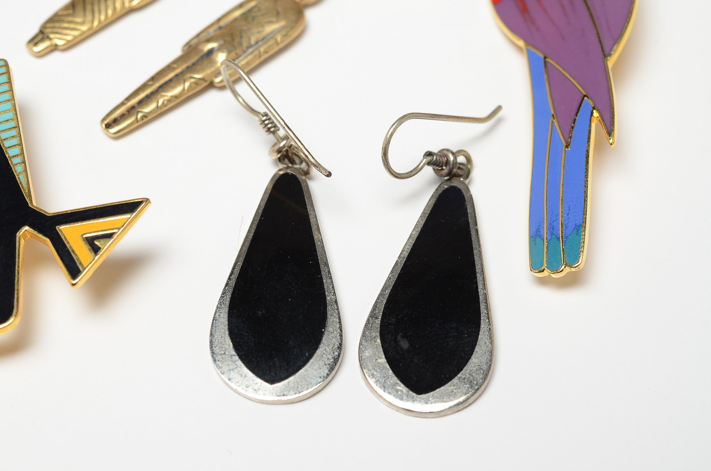 Collection of Laurel Burch Brooches and Earrings