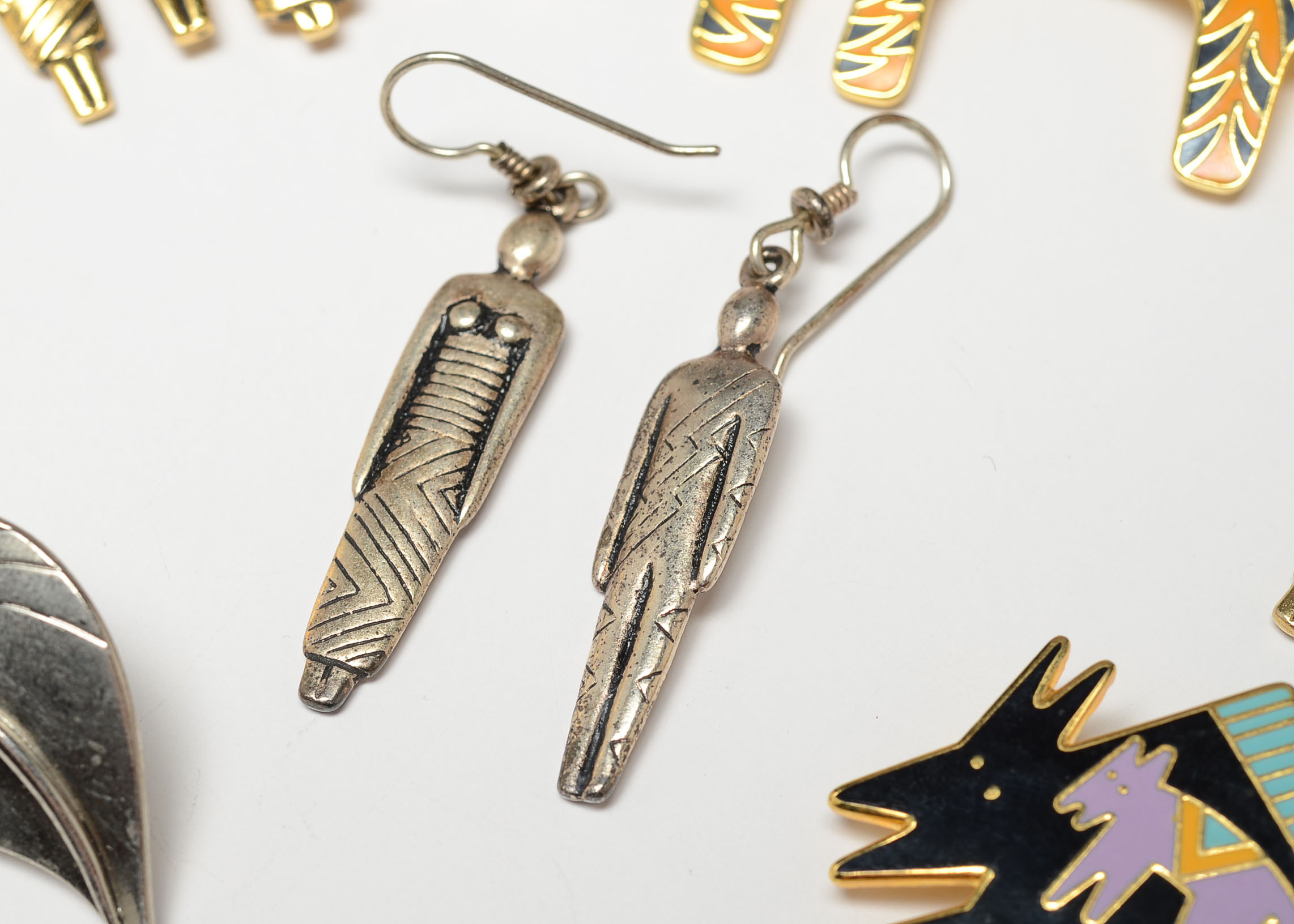 Collection of Laurel Burch Brooches and Earrings