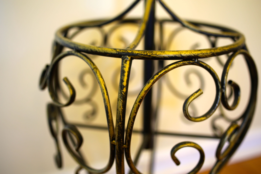 Distressed Gold Tone and Black Coat Rack