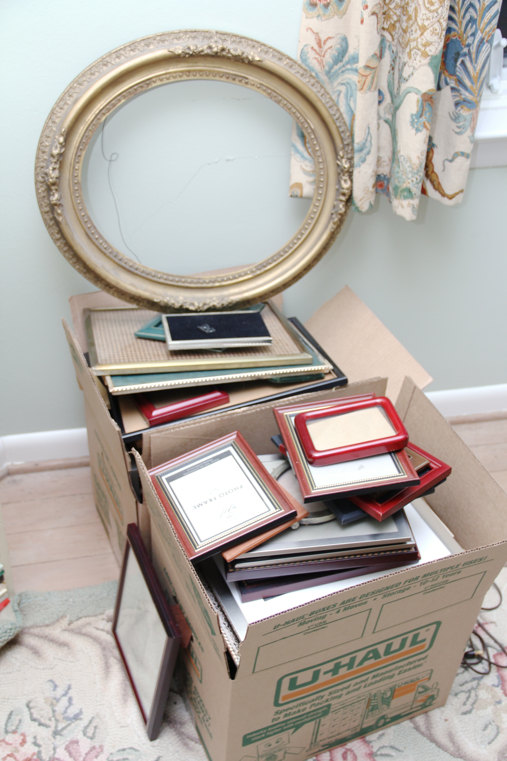 A Large Grouping of Photo Frames