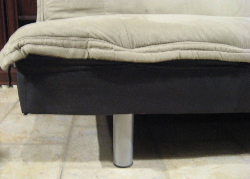 Black Futon with a Tan Suede Microfiber Cushion