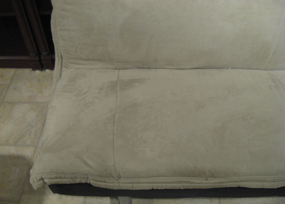 Black Futon with a Tan Suede Microfiber Cushion